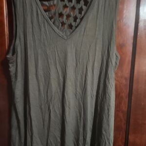 Olive Green Seeveless Tank Top With The American Flag Cut Out.